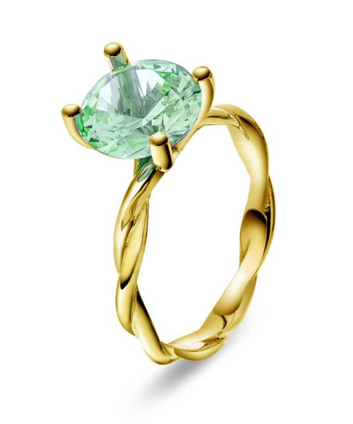 Ring i gull med syntetisk krysolitt