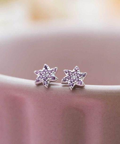 Alternative view of Øredobber i sølv med zirkonia blomst