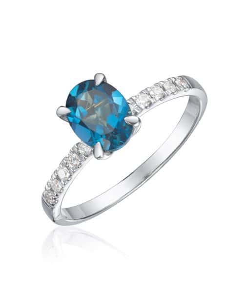 Ring Olivia i hvitt gull med 0,12ct WSI og topas oval midtstein