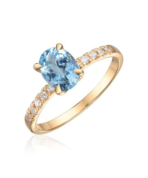 Ring Olivia i gult gull med 0,12ct WSI og akvamarin oval midtstein